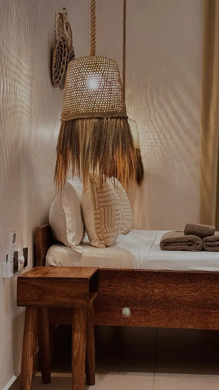 King bed under two woven pendant lamps